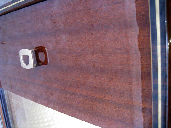 This fun Italian art deco bar cart is from the 1940’s and is veneered in rosewood polished to a high gloss.